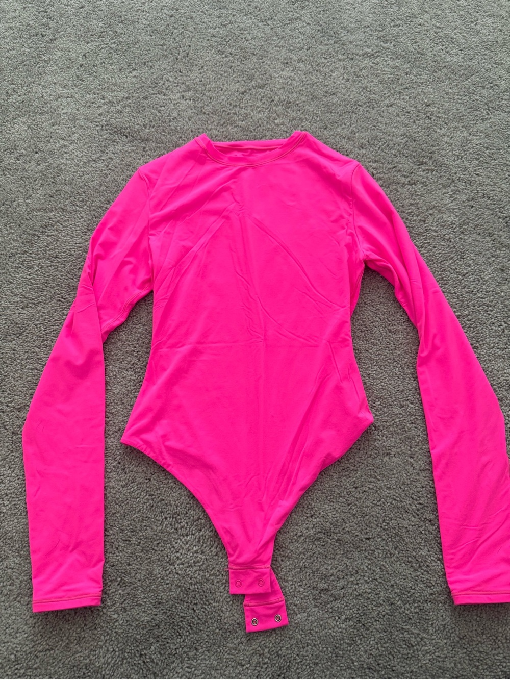 SKIMS Long Sleeve One-Piece Bodysuit in Hot Pink